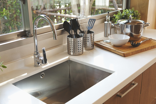 How can I unclog my kitchen sink